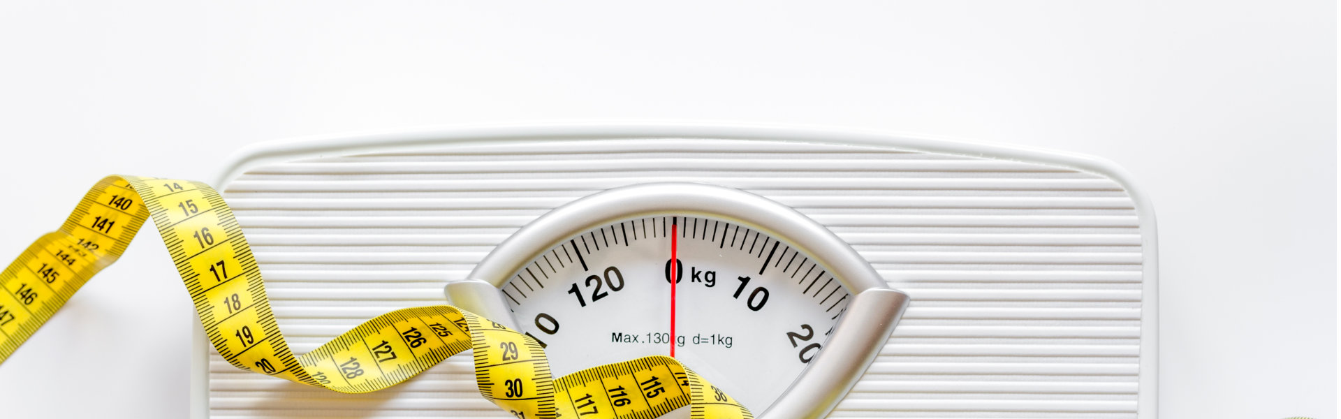 A measuring tape and a weighing scale